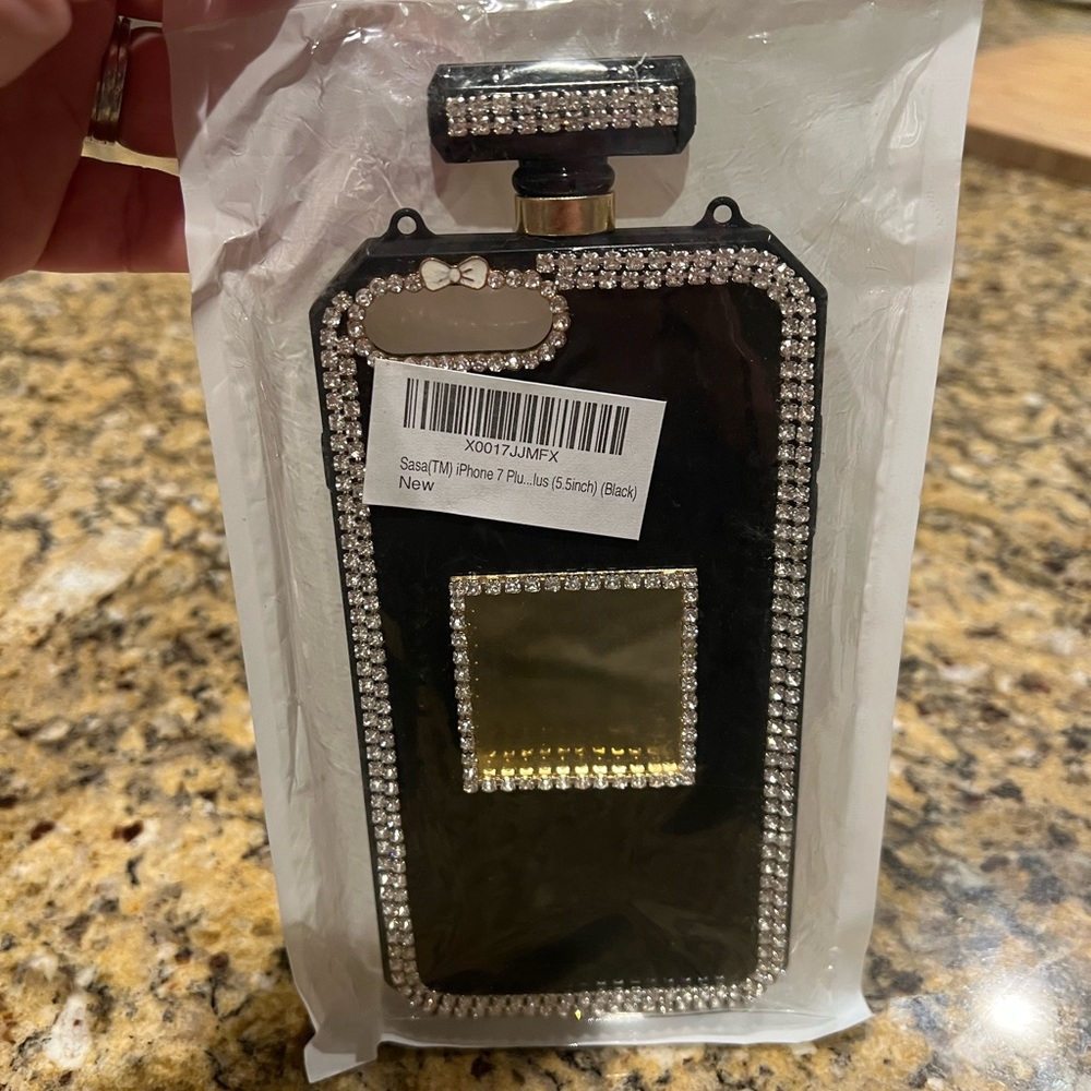 Black perfume bottle phone case with rhinestone & bow accents for iPhone 7 Plus.